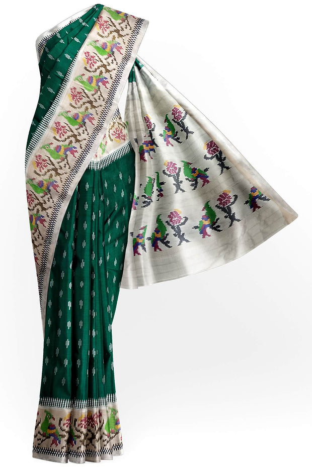 Handwoven ikat pure silk saree in dark green with small motifs