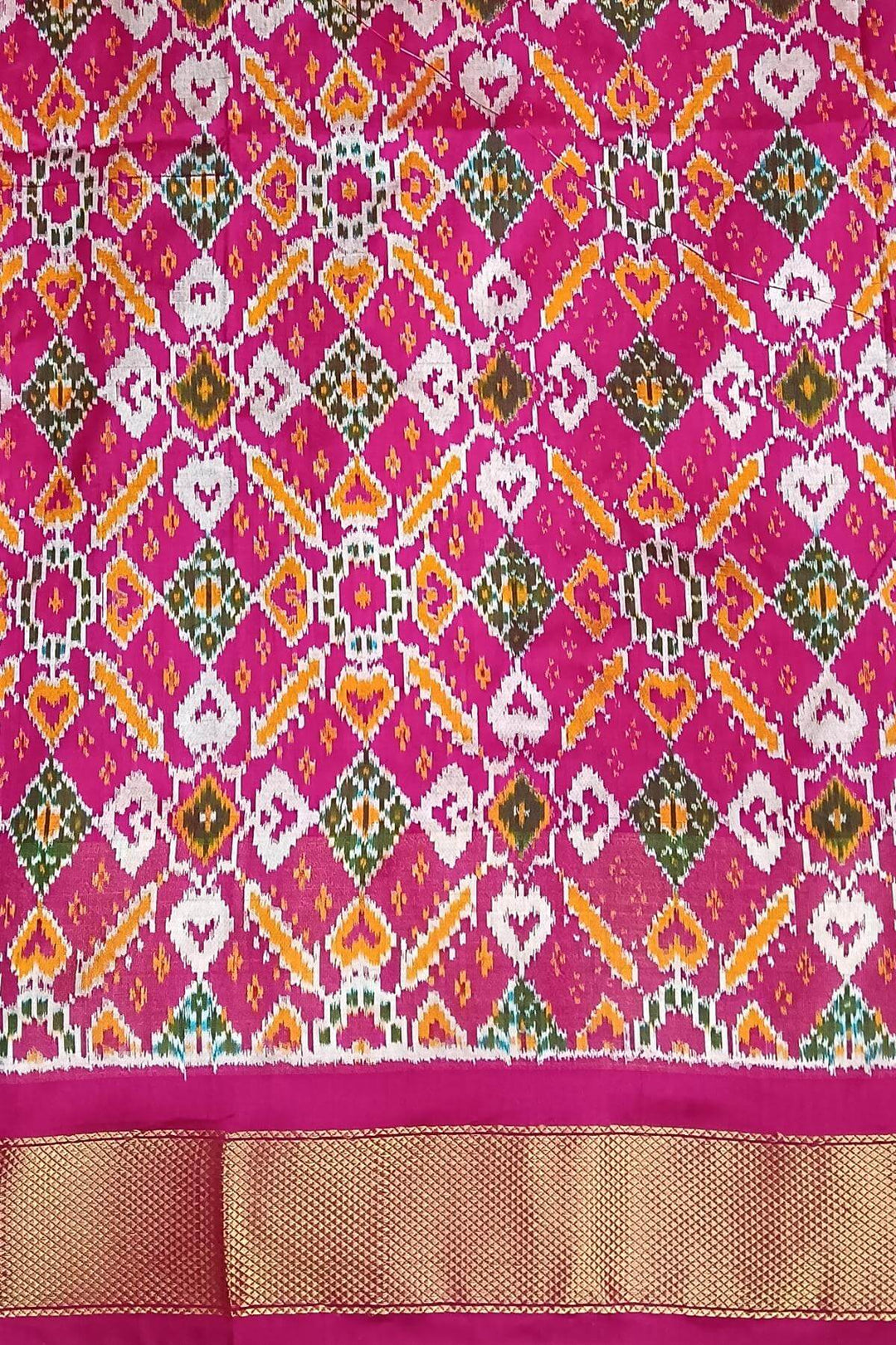 Handwoven Ikat pure silk saree in  dark wine  with elephant & bird motifs in skirt border . .