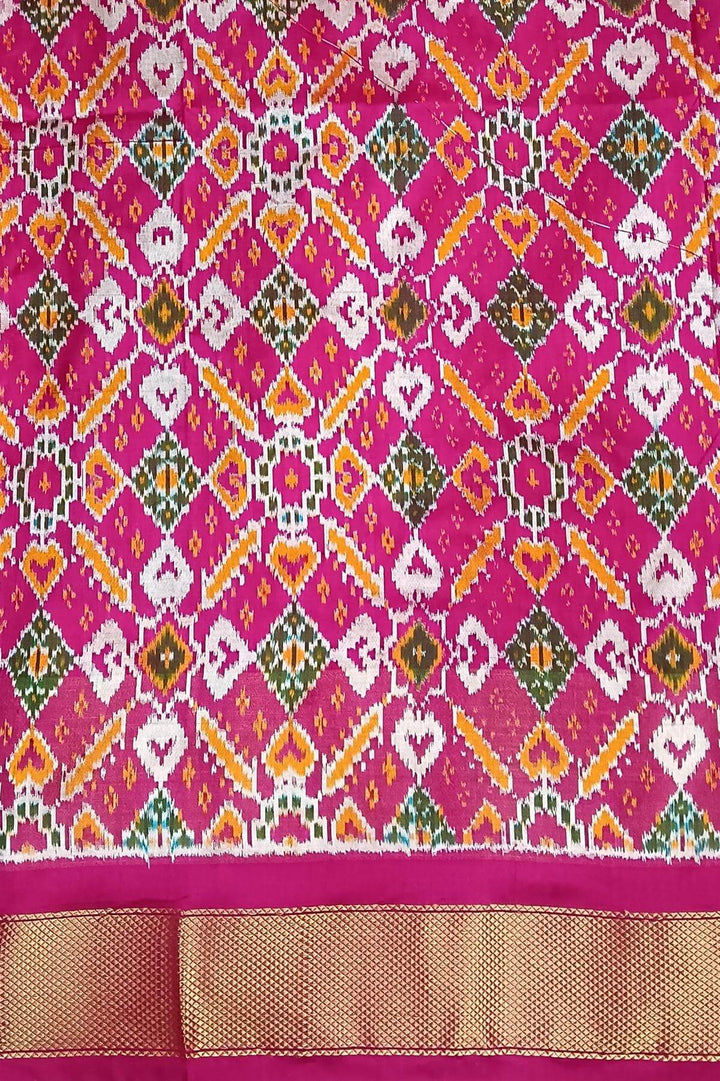 Handwoven Ikat pure silk saree in  dark wine  with elephant & bird motifs in skirt border . .