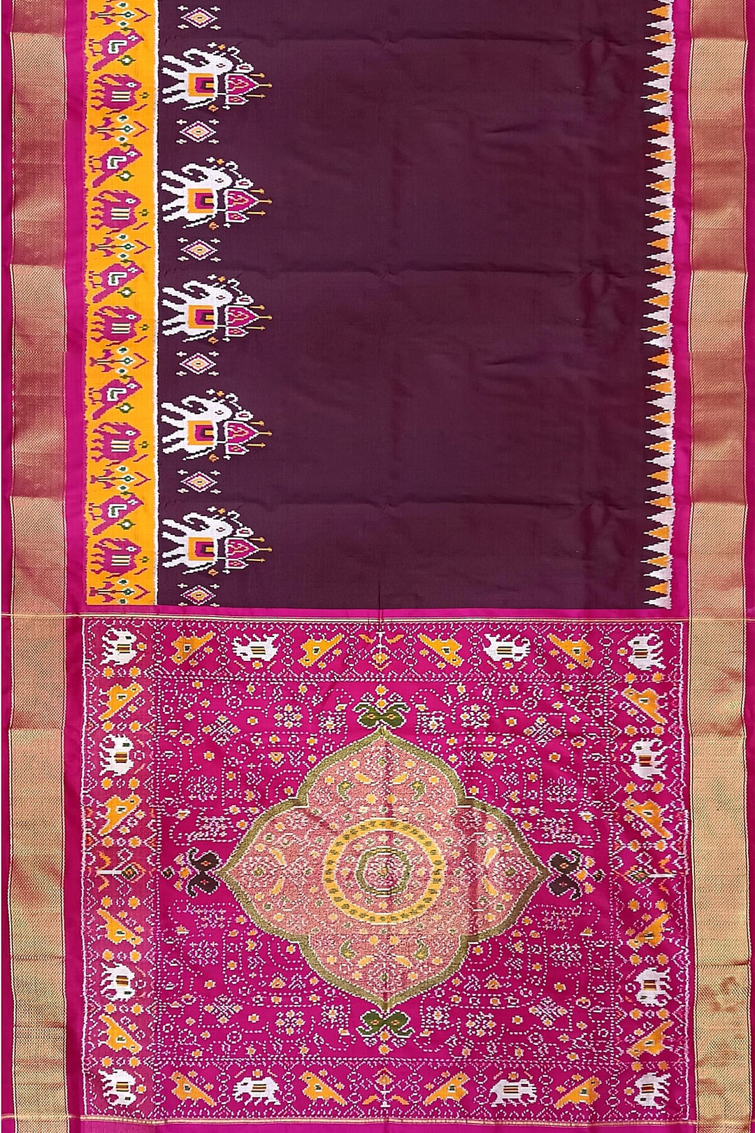Handwoven Ikat pure silk saree in  dark wine  with elephant & bird motifs in skirt border . .