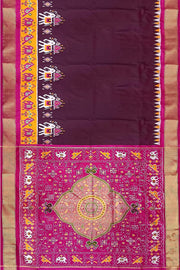 Handwoven Ikat pure silk saree in  dark wine  with elephant & bird motifs in skirt border . .