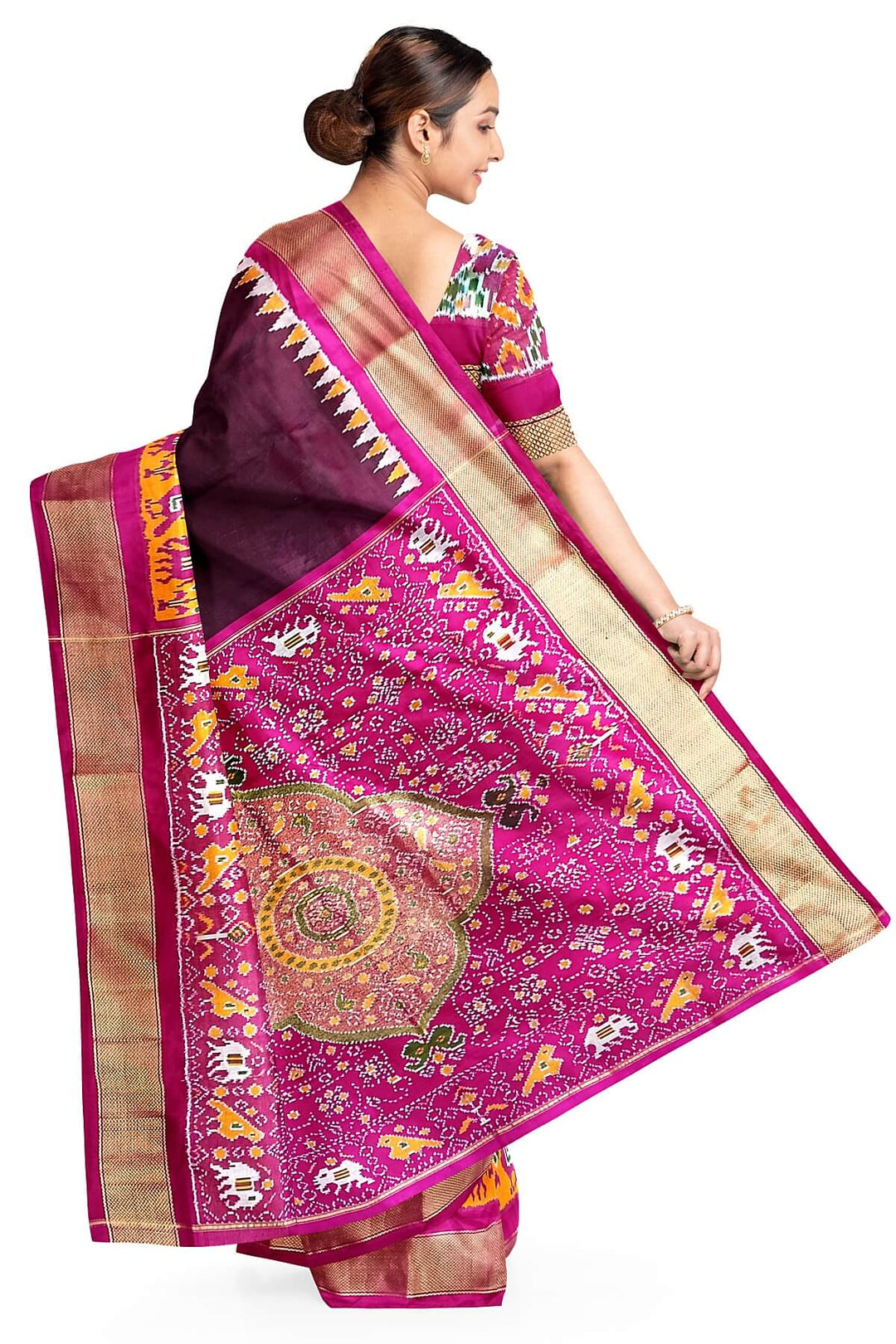 Handwoven Ikat pure silk saree in  dark wine  with elephant & bird motifs in skirt border . .