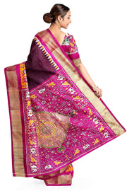 Handwoven Ikat pure silk saree in  dark wine  with elephant & bird motifs in skirt border . .