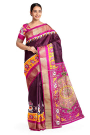 Handwoven Ikat pure silk saree in  dark wine  with elephant & bird motifs in skirt border . .