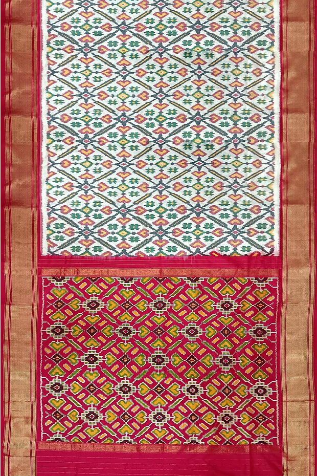 Handwoven ikat pure silk saree in off white in pan bhat pattern