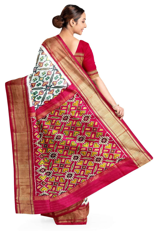 Handwoven ikat pure silk saree in off white in pan bhat pattern