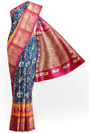 A peacock blue ikat pure silk saree in narikunj pattern with elephant motifs in skirt border.