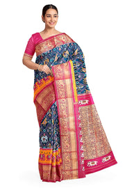 A peacock blue ikat pure silk saree in narikunj pattern with elephant motifs in skirt border.