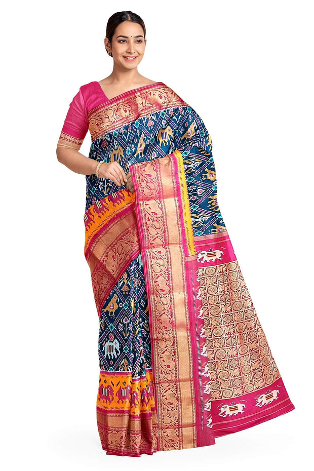 A peacock blue ikat pure silk saree in narikunj pattern with elephant motifs in skirt border.