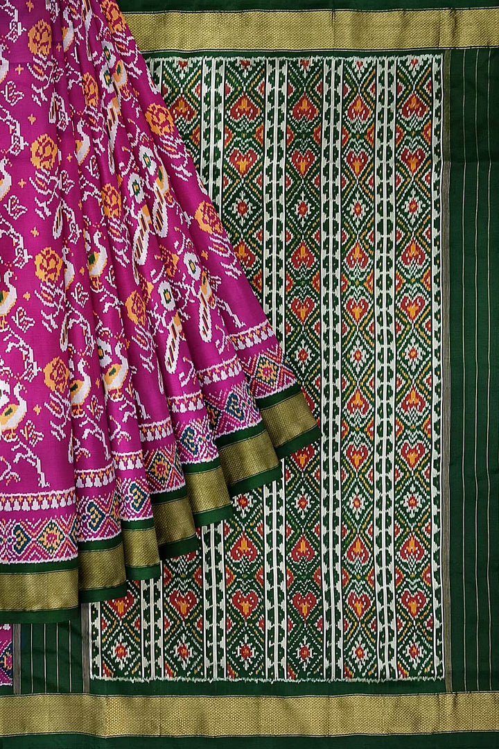 Handwoven ikat pure silk saree in  purple with bird motifs