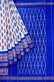 Handwoven ikat pure silk saree in silver with leaf motifs on the body