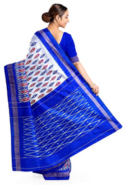 Handwoven ikat pure silk saree in silver with leaf motifs on the body