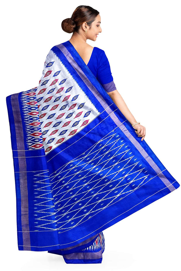 Handwoven ikat pure silk saree in silver with leaf motifs on the body