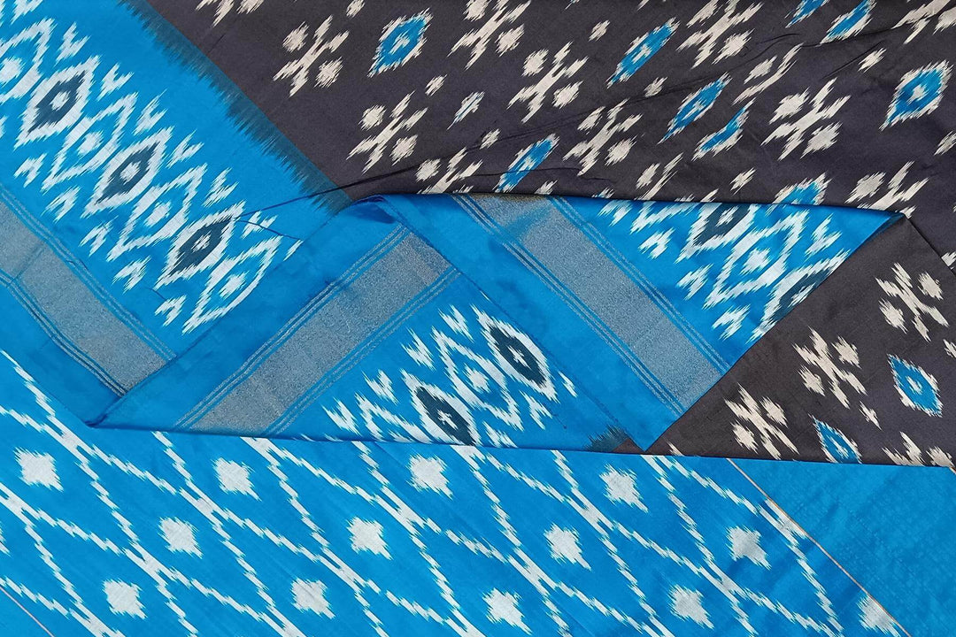 Handwoven ikat pure silk saree in grey with absract pattern on the body