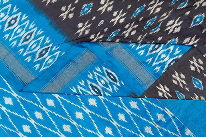 Handwoven ikat pure silk saree in grey with absract pattern on the body
