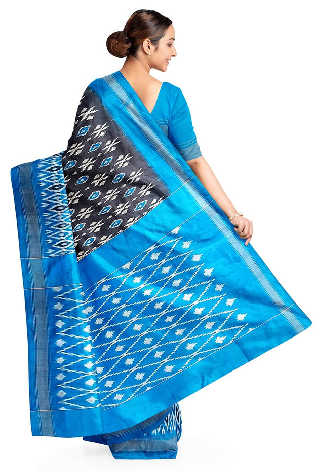 Handwoven ikat pure silk saree in grey with absract pattern on the body