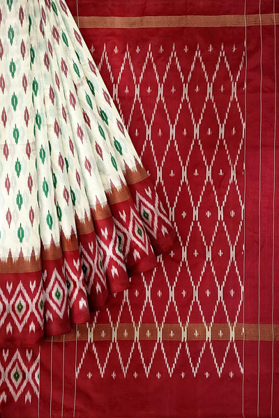 Handwoven ikat pure silk saree in  off white with leaf motifs on the body