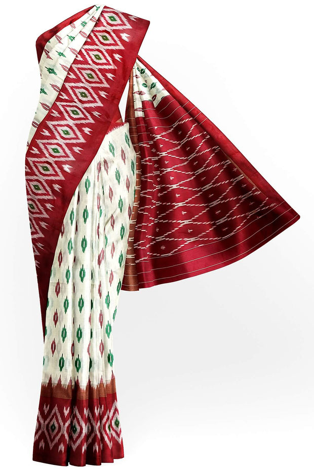 Handwoven ikat pure silk saree in  off white with leaf motifs on the body