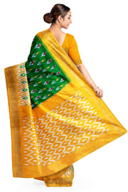 Handwoven ikat pure silk saree in green with anchor motifs on the body