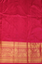 A blue colour  ikkat pure silk saree in navratan pattern .