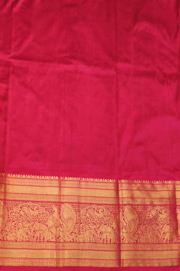 A blue colour  ikkat pure silk saree in navratan pattern .