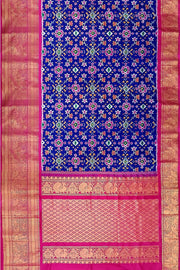 A blue colour  ikkat pure silk saree in navratan pattern .
