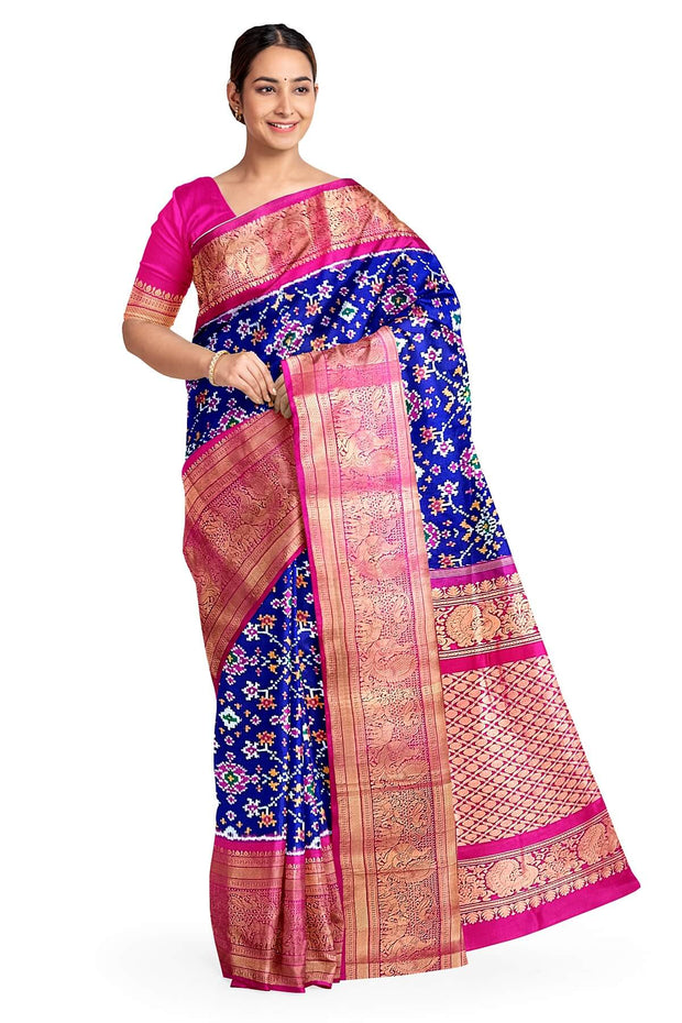 A blue colour  ikkat pure silk saree in navratan pattern .