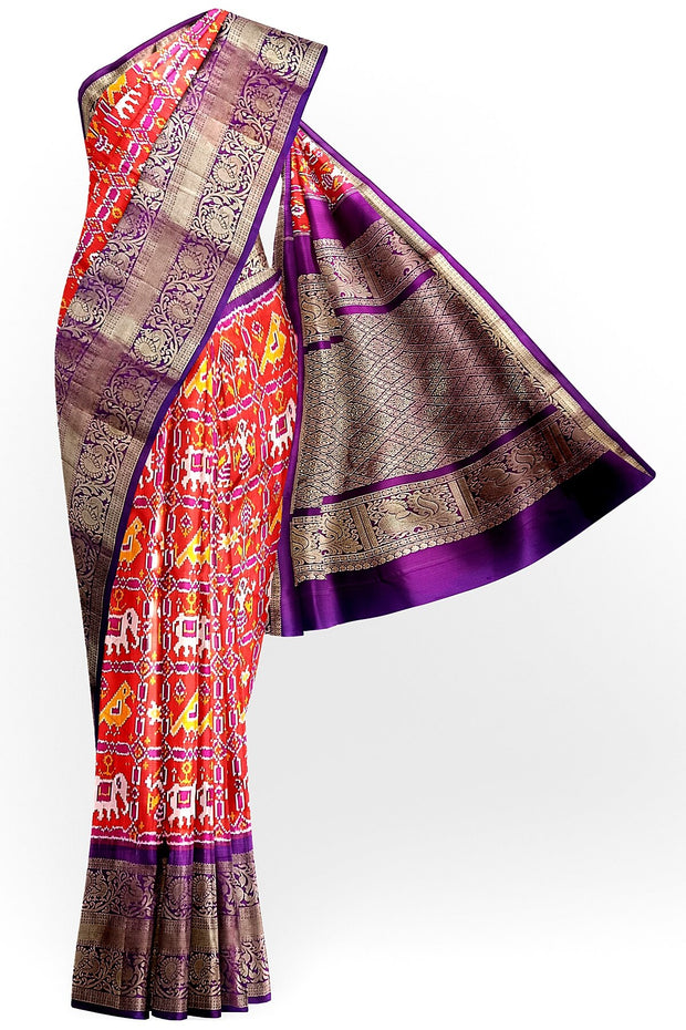 An orange colour ikkat pure silk saree in narikunj  pattern .