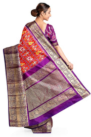 An orange colour ikkat pure silk saree in narikunj  pattern .