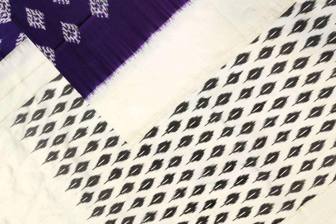 Handwoven ikat pure silk saree in purple with diamond motifs