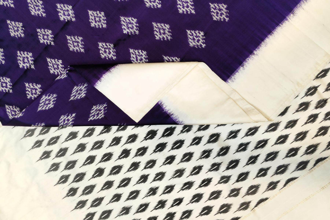 Handwoven ikat pure silk saree in purple with diamond motifs