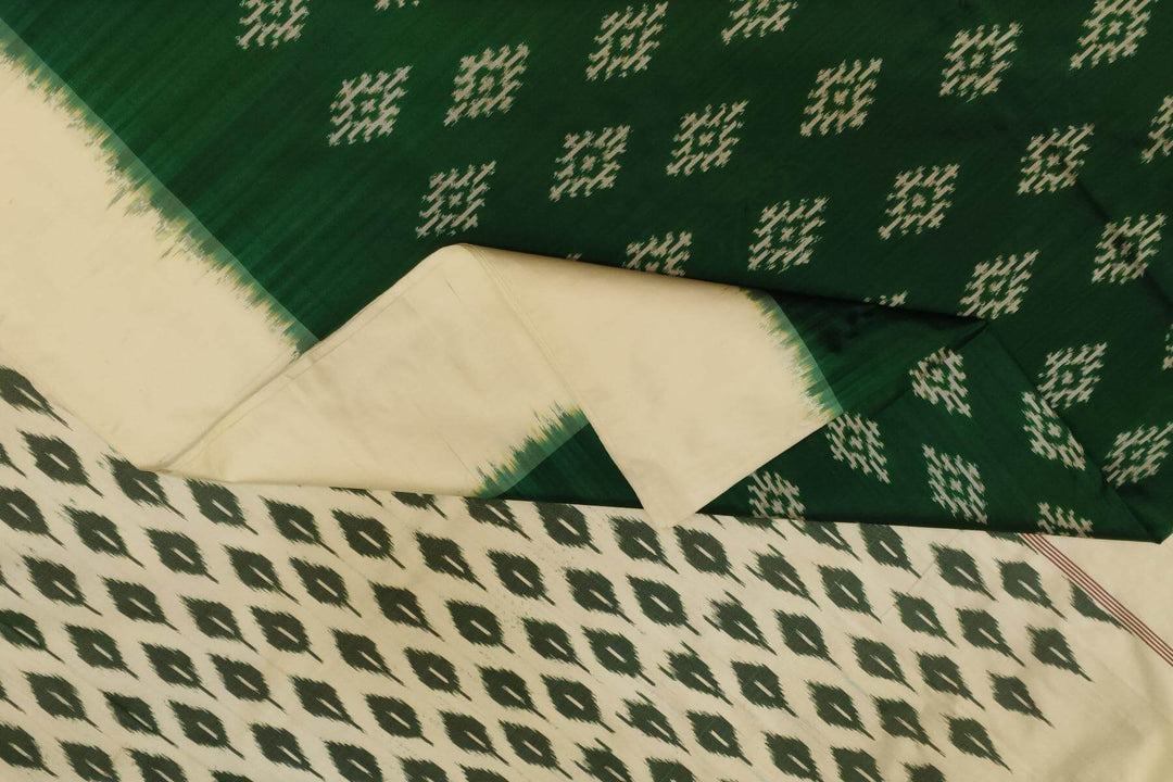 Handwoven ikat pure silk saree in green with diamond motifs