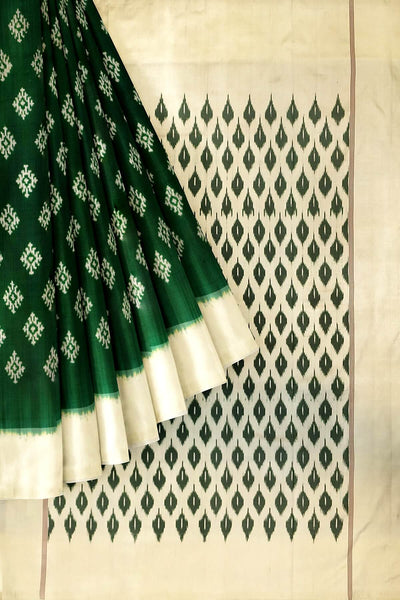 Handwoven ikat pure silk saree in green with diamond motifs