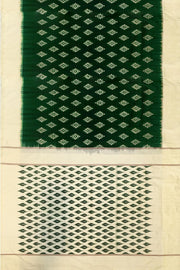 Handwoven ikat pure silk saree in green with diamond motifs