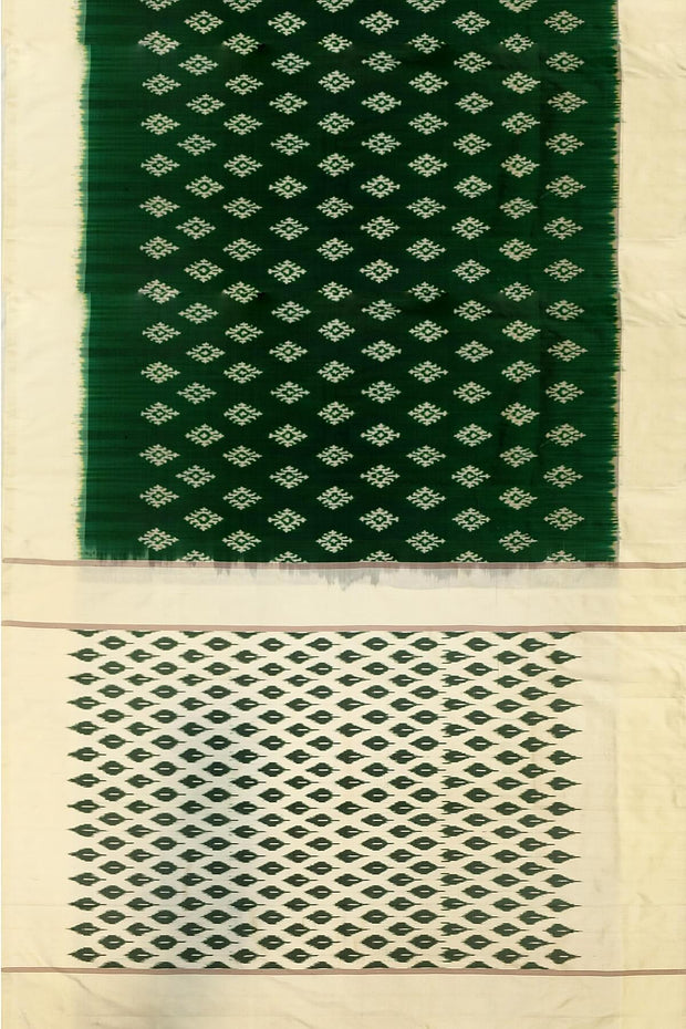 Handwoven ikat pure silk saree in green with diamond motifs