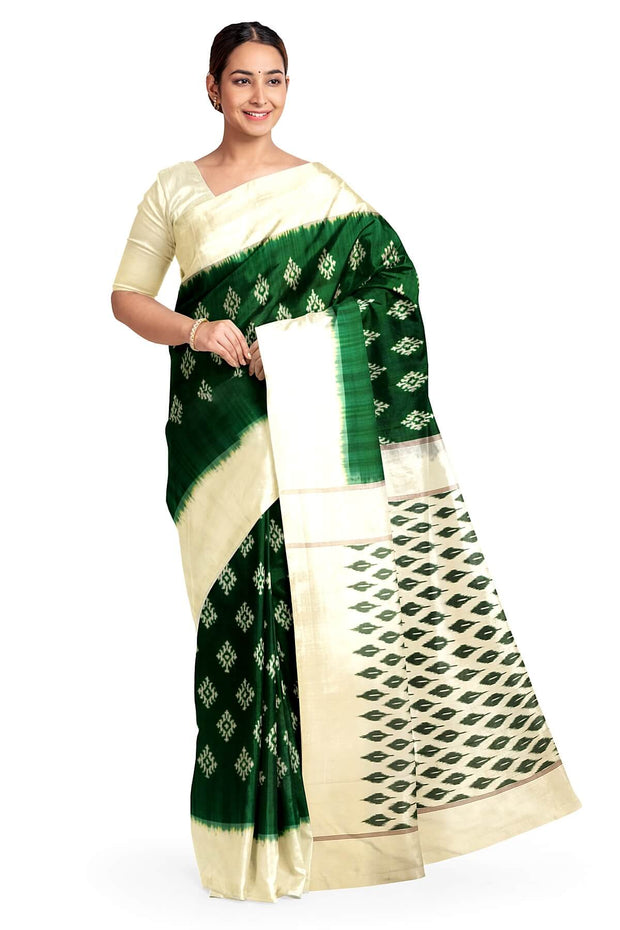 Handwoven ikat pure silk saree in green with diamond motifs