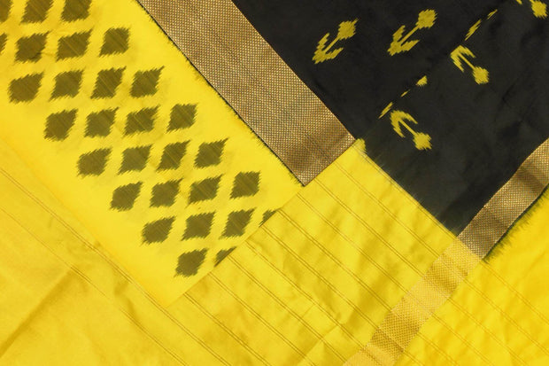 Handwoven ikat pure silk saree in black with anchor motifs