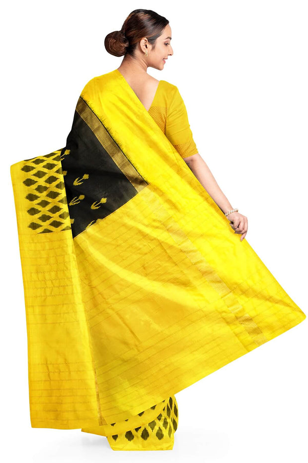 Handwoven ikat pure silk saree in black with anchor motifs