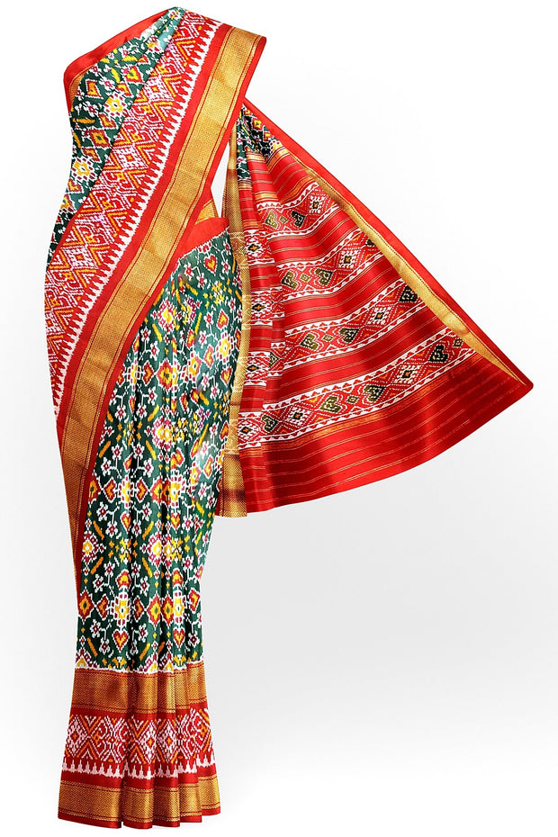 Ikkat pure silk saree in bottle green with a combo of navratan &  pan bhat pattern.
