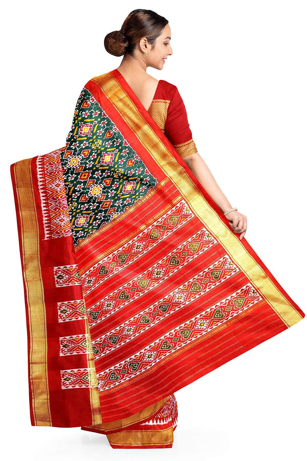 Ikkat pure silk saree in bottle green with a combo of navratan &  pan bhat pattern.
