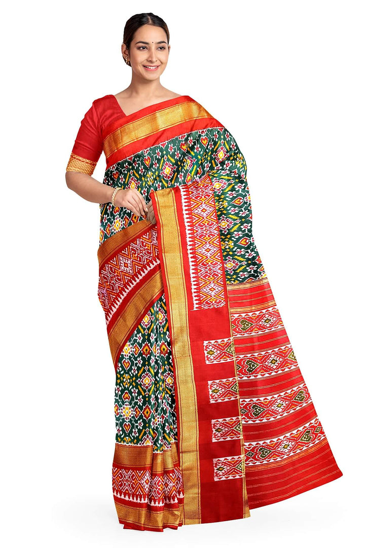 Ikkat pure silk saree in bottle green with a combo of navratan &  pan bhat pattern.