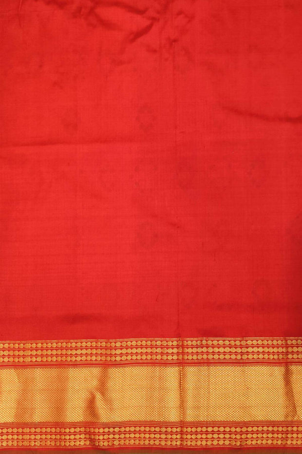 Ikkat pure silk saree in red in navratan pattern.