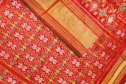 Ikkat pure silk saree in red in navratan pattern.