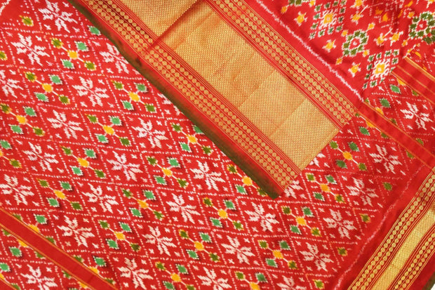 Ikkat pure silk saree in red in navratan pattern.