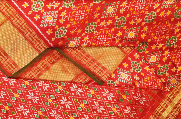Ikkat pure silk saree in red in navratan pattern.