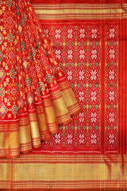 Ikkat pure silk saree in red in navratan pattern.