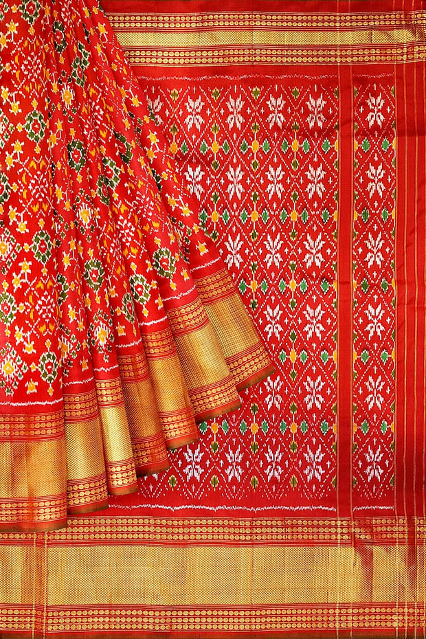 Ikkat pure silk saree in red in navratan pattern.