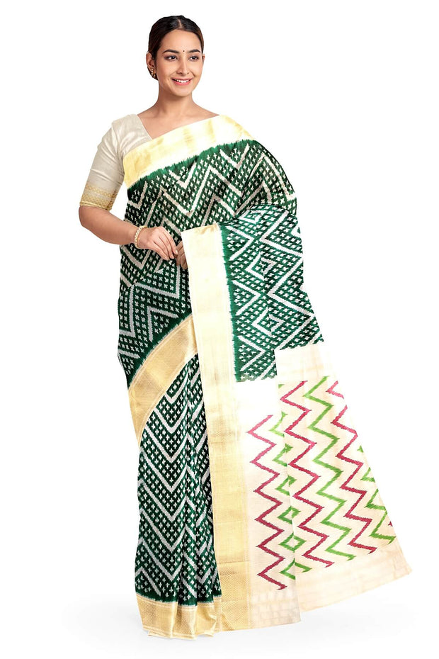 Ikkat pure silk saree in bottle green in zig zag pattern.