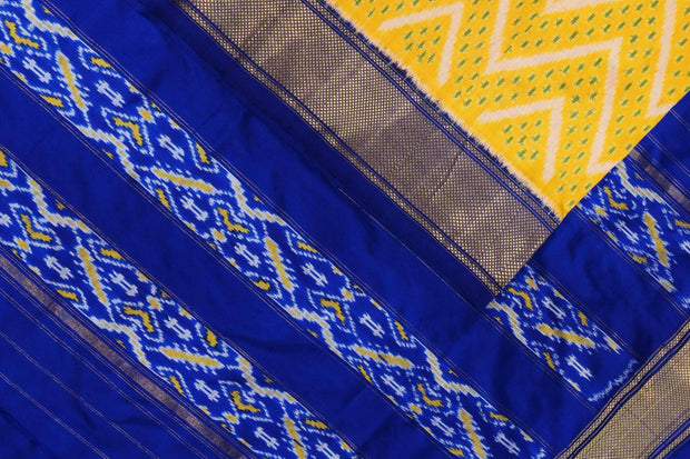 Ikkat pure silk saree in yellow in zig zag pattern.