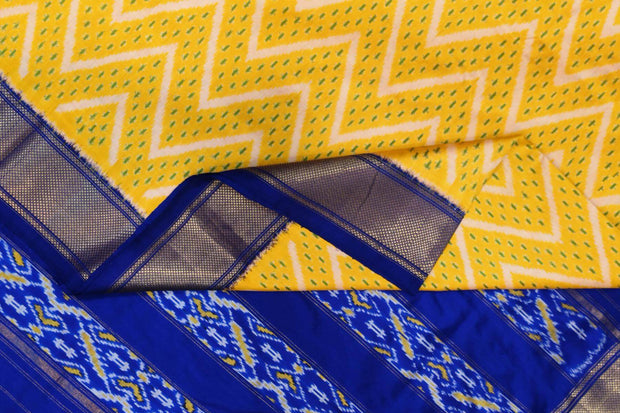 Ikkat pure silk saree in yellow in zig zag pattern.